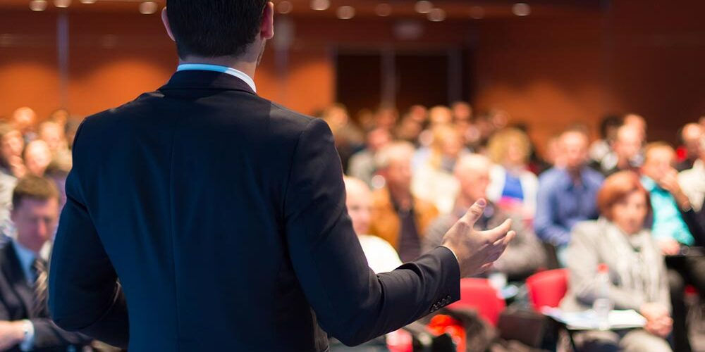 Sala affollata durante un evento E.ON per gli amministratori di condominio